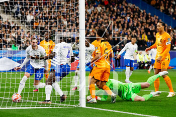 2023-03-24 - Dayot Upamecano of France scores his sides second goal past Jasper Cillessen of the Netherlands during the UEFA Euro 2024, European Qualifiers, Group B football match between France and Netherlands on March 24, 2023 at Stade de France in Saint-Denis near Paris, France - FOOTBALL - EURO 2024 - QUALIFYING - FRANCE V NETHERLANDS - UEFA EUROPEAN - SOCCER