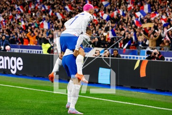 2023-03-24 - Kylian Mbappe of France and Antoine Griezmann of France celebrate their sides first goal during the UEFA Euro 2024, European Qualifiers, Group B football match between France and Netherlands on March 24, 2023 at Stade de France in Saint-Denis near Paris, France - FOOTBALL - EURO 2024 - QUALIFYING - FRANCE V NETHERLANDS - UEFA EUROPEAN - SOCCER