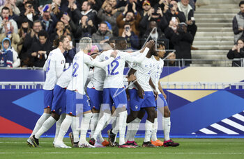 2023-03-25 - Dayot Upamecano of France (right) celebrates his goal with teammates during the UEFA Euro 2024, European Qualifiers, Group B football match between France and Netherlands on March 24, 2023 at Stade de France in Saint-Denis near Paris, France - FOOTBALL - EURO 2024 - QUALIFYING - FRANCE V NETHERLANDS - UEFA EUROPEAN - SOCCER