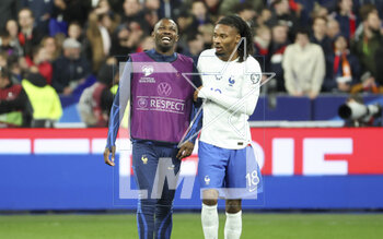2023-03-25 - Marcus Thuram and his brother Khephren Thuram of France celebrate the victory following the UEFA Euro 2024, European Qualifiers, Group B football match between France and Netherlands on March 24, 2023 at Stade de France in Saint-Denis near Paris, France - FOOTBALL - EURO 2024 - QUALIFYING - FRANCE V NETHERLANDS - UEFA EUROPEAN - SOCCER