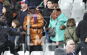 2023-03-25 - Lilian Thuram and Kareen Guiock attend the UEFA Euro 2024, European Qualifiers, Group B football match between France and Netherlands on March 24, 2023 at Stade de France in Saint-Denis near Paris, France - FOOTBALL - EURO 2024 - QUALIFYING - FRANCE V NETHERLANDS - UEFA EUROPEAN - SOCCER