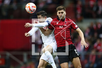 2023-03-27 - Robert Lewandowski of Poland and Marash Kumbulla of Albania during the UEFA Euro 2024, European Qualifiers, Group E football match between Poland and Albania on March 27, 2023 at PGE Narodowy in Warsaw, Poland - FOOTBALL - EURO 2024 - QUALIFYING - POLAND V ALBANIA - UEFA EUROPEAN - SOCCER