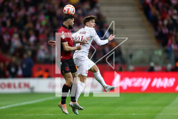 2023-03-27 - Elseid Hysaj of Albania and Nicola Zalewski of Poland during the UEFA Euro 2024, European Qualifiers, Group E football match between Poland and Albania on March 27, 2023 at PGE Narodowy in Warsaw, Poland - FOOTBALL - EURO 2024 - QUALIFYING - POLAND V ALBANIA - UEFA EUROPEAN - SOCCER