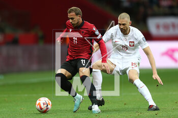 2023-03-27 - Taunt Seferi of Albania and Bartosz Salamon of Poland during the UEFA Euro 2024, European Qualifiers, Group E football match between Poland and Albania on March 27, 2023 at PGE Narodowy in Warsaw, Poland - FOOTBALL - EURO 2024 - QUALIFYING - POLAND V ALBANIA - UEFA EUROPEAN - SOCCER