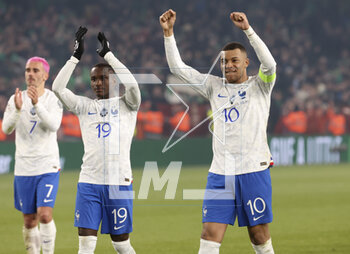 2023-03-27 - From right, Kylian Mbappe, Moussa Diaby, Antoine Griezmann of France celebrate the victory following the UEFA Euro 2024, European Qualifiers, Group B football match between Republic of Ireland and France on March 27, 2023 at Dublin Arena in Dublin, Republic of Ireland - FOOTBALL - EURO 2024 - QUALIFYING - REPUBLIC OF IRELAND V FRANCE - UEFA EUROPEAN - SOCCER