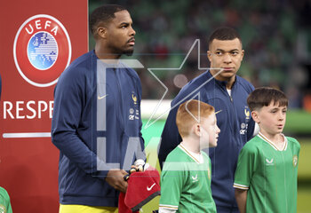 2023-03-27 - France goalkeeper Mike Maignan, Kylian Mbappe of France during the UEFA Euro 2024, European Qualifiers, Group B football match between Republic of Ireland and France on March 27, 2023 at Dublin Arena in Dublin, Republic of Ireland - FOOTBALL - EURO 2024 - QUALIFYING - REPUBLIC OF IRELAND V FRANCE - UEFA EUROPEAN - SOCCER