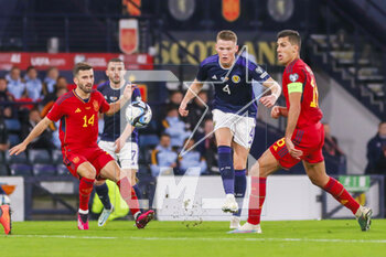 2023-03-28 - Scott McTominay of Scotland and Jose Gaya, Rodri of Spain during the UEFA Euro 2024, European Qualifiers, Group A football match between Scotland and Spain on March 28, 2023 at Hampden Park in Glasgow, Scotland - FOOTBALL - EURO 2024 - QUALIFYING - SCOTLAND V SPAIN - UEFA EUROPEAN - SOCCER