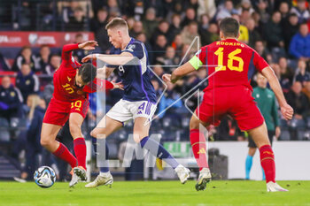 2023-03-28 - Scott McTominay of Scotland and Dani Ceballos of Spain during the UEFA Euro 2024, European Qualifiers, Group A football match between Scotland and Spain on March 28, 2023 at Hampden Park in Glasgow, Scotland - FOOTBALL - EURO 2024 - QUALIFYING - SCOTLAND V SPAIN - UEFA EUROPEAN - SOCCER