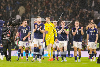2023-03-28 - Scotland players celebrate after the UEFA Euro 2024, European Qualifiers, Group A football match between Scotland and Spain on March 28, 2023 at Hampden Park in Glasgow, Scotland - FOOTBALL - EURO 2024 - QUALIFYING - SCOTLAND V SPAIN - UEFA EUROPEAN - SOCCER