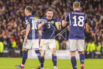 2023-03-28 - Andy Robertson and Lewis Ferguson of Scotland celebrate after the UEFA Euro 2024, European Qualifiers, Group A football match between Scotland and Spain on March 28, 2023 at Hampden Park in Glasgow, Scotland - FOOTBALL - EURO 2024 - QUALIFYING - SCOTLAND V SPAIN - UEFA EUROPEAN - SOCCER