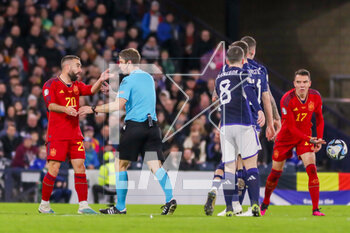 2023-03-28 - Yellow card Dani Carvajal of Spain during the UEFA Euro 2024, European Qualifiers, Group A football match between Scotland and Spain on March 28, 2023 at Hampden Park in Glasgow, Scotland - FOOTBALL - EURO 2024 - QUALIFYING - SCOTLAND V SPAIN - UEFA EUROPEAN - SOCCER