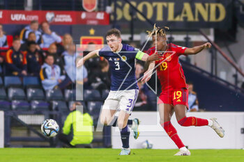 2023-03-28 - Andy Robertson of Scotland and Nico Williams of Spain during the UEFA Euro 2024, European Qualifiers, Group A football match between Scotland and Spain on March 28, 2023 at Hampden Park in Glasgow, Scotland - FOOTBALL - EURO 2024 - QUALIFYING - SCOTLAND V SPAIN - UEFA EUROPEAN - SOCCER