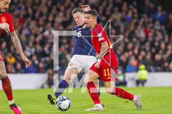 2023-03-28 - Callum McGregor of Scotland and Yeremy Pino of Spain during the UEFA Euro 2024, European Qualifiers, Group A football match between Scotland and Spain on March 28, 2023 at Hampden Park in Glasgow, Scotland - FOOTBALL - EURO 2024 - QUALIFYING - SCOTLAND V SPAIN - UEFA EUROPEAN - SOCCER