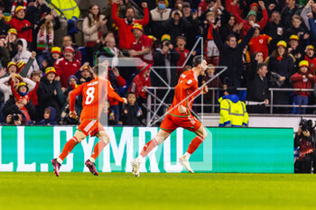 2023-03-28 - Wales' forward Kiefer Moore (13) celebrates scoring the opening goal during the UEFA Euro 2024, European Qualifiers football match between Wales and Latvia on 28 March 2023 at the Cardiff City Stadium in Cardiff, Wales - FOOTBALL - EURO 2024 - QUALIFYING - WALES V LATVIA - UEFA EUROPEAN - SOCCER