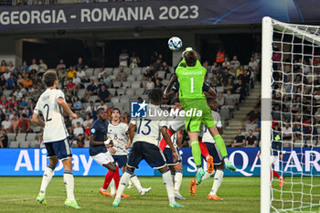 2023-06-22 - Italy U21’s Marco Carnesecchi pushes the ball away with his fists during the first qualifying round UEFA European Under-21 Championship 2023 soccer match Italy U21 vs. France U21 at the Cluj Arena stadium in Cluj Napoca, Romania, 22nd of June 2023 - UNDER 21 MEN - FRANCE VS ITALY - UEFA EUROPEAN - SOCCER