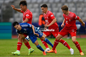 2023-06-25 - Foul play of Swiss U21’s Lewin Blum on Italy U21’s Fabiano Parisi during the first qualifying round UEFA European Under-21 Championship 2023 soccer match Italy U21 vs. Swiss U21 at the Cluj Arena stadium in Cluj Napoca, Romania, 25nd of June 2023 - UNDER 21 MEN - SWITZERLAND VS ITALY - UEFA EUROPEAN - SOCCER