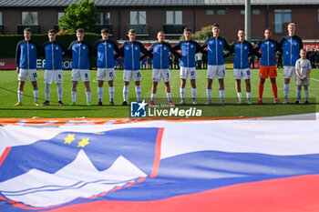 2023-05-24 - Slovenia U17 lined up for the national anthems ceremony during the qualifying phase Under-17 Championship Hungary 2023 soccer match Italy U17 vs. Slovenia U17 at the Globall Football Park stadium in Telki, Hungary, 24th of May 2023 - UNDER 17 MEN - SLOVENIA VS ITALY - UEFA EUROPEAN - SOCCER