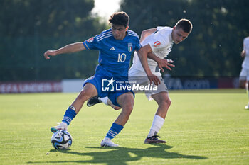 2023-05-24 - Italy U17’s Marco Romano in action during the qualifying phase Under-17 Championship Hungary 2023 soccer match Italy U17 vs. Slovenia U17 at the Globall Football Park stadium in Telki, Hungary, 24th of May 2023 - UNDER 17 MEN - SLOVENIA VS ITALY - UEFA EUROPEAN - SOCCER