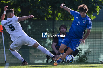 2023-05-24 - Slovenia U17’s Aldin Jakupovic and Italy U17’s Matteo Cocchi during the qualifying phase Under-17 Championship Hungary 2023 soccer match Italy U17 vs. Slovenia U17 at the Globall Football Park stadium in Telki, Hungary, 24th of May 2023 - UNDER 17 MEN - SLOVENIA VS ITALY - UEFA EUROPEAN - SOCCER