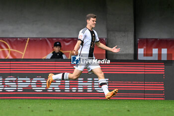 2023-05-30 - Happiness of Germany U17’s Robert Ramsak during the qualifying phase Under-17 Championship Hungary 2023 soccer match Poland U17 vs. Germany U17 at the Pancho Arena stadium in Felcsut, Hungary, 30rd of May 2023 - U17 - POLAND U17 VS GERMANY U17 - UEFA EUROPEAN - SOCCER