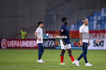2023-06-02 - Jean Luc Vannuchi head coach of France U17 shows his disappointment after have lost the final phase Under-17 Championship Hungary 2023 soccer match vs. France U17 at the Nandor Hidegkuti Stadion stadium in Budapest, Hungary, 2nd of June 2023 - UNDER 17 FINAL - GERMANY VS FRANCE - UEFA EUROPEAN - SOCCER