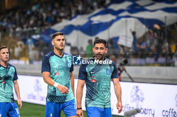 2023-06-16 - 11 ANASTASIOS BAKASETAS with 4 KONSTANTINOS MAVROPANOS of Greece during the UEFA EURO 2024 qualifying round group B match between Greece and the Republic of Ireland at OPAP Arena on May 16, 2023, in Athens, Greece. - QUALIFICATIONS - GREECE VS IRELAND - UEFA EUROPEAN - SOCCER