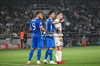 2023-06-16 - 11 ANASTASIOS BAKASETAS with 9 VANGELIS PAVLIDIS of Greece during the UEFA EURO 2024 qualifying round group B match between Greece and the Republic of Ireland at OPAP Arena on May 16, 2023, in Athens, Greece. - QUALIFICATIONS - GREECE VS IRELAND - UEFA EUROPEAN - SOCCER