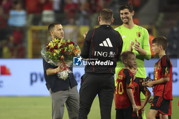 2023-06-17 - Former Red Devils captain Eden Hazard is celebrated - here with Belgium goalkeeper Thibaut Courtois - for the end of his career with the Belgian national team Red Devils following the UEFA Euro 2024, European Qualifiers, Group F, football match between Belgium and Austria on June 17, 2023 at King Baudouin Stadium in Brussels, Belgique - FOOTBALL - EURO 2024 - QUALIFYING - BELGIUM V AUSTRIA - UEFA EUROPEAN - SOCCER