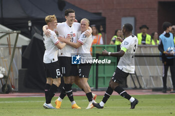 2023-06-17 - Nicolas Seiwald, Michael Gregoritsch, Xaver Schlager, David Alaba of Austria celebrate their goal during the UEFA Euro 2024, European Qualifiers, Group F, football match between Belgium and Austria on June 17, 2023 at King Baudouin Stadium in Brussels, Belgique - FOOTBALL - EURO 2024 - QUALIFYING - BELGIUM V AUSTRIA - UEFA EUROPEAN - SOCCER