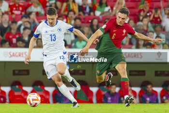 2023-06-17 - Gojko Cimirot of Bosnia and Herzegovina and Joao Palhinha of Portugal during the UEFA Euro 2024, European Qualifiers, Group J, football match between Portugal and Bosnia and Herzegovina on June 17, 2023 at Estádio do SL Benfica in Lisbon, Portugal - FOOTBALL - EURO 2024 - QUALIFYING - PORTUGAL V BOSNIA HERZEGOVINA - UEFA EUROPEAN - SOCCER
