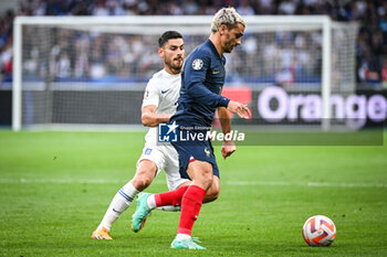 2023-06-19 - Giorgos MASOURAS of Greece and Antoine GRIEZMANN of France during the UEFA Euro 2024, European Qualifiers, Group B, football match between France and Greece on June 19, 2023 at Stade de France in Saint-Denis, France - FOOTBALL - EURO 2024 - QUALIFYING - FRANCE V GREECE - UEFA EUROPEAN - SOCCER