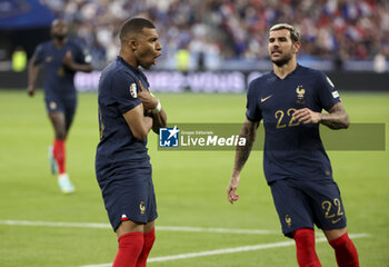 2023-06-19 - Kylian Mbappe of France celebrates his goal with Theo Hernandez during the UEFA Euro 2024, European Qualifiers, Group B, football match between France and Greece on June 19, 2023 at Stade de France in Saint-Denis, France - FOOTBALL - EURO 2024 - QUALIFYING - FRANCE V GREECE - UEFA EUROPEAN - SOCCER
