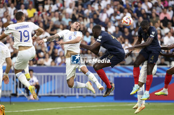 2023-06-19 - Giorgos Giakoumakis, Dimitris Kourbelis of Greece, Ibrahima Konate and Dayot Upamecano of France during the UEFA Euro 2024, European Qualifiers, Group B, football match between France and Greece on June 19, 2023 at Stade de France in Saint-Denis, France - FOOTBALL - EURO 2024 - QUALIFYING - FRANCE V GREECE - UEFA EUROPEAN - SOCCER
