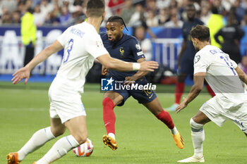 2023-06-19 - Christopher Nkunku of France during the UEFA Euro 2024, European Qualifiers, Group B, football match between France and Greece on June 19, 2023 at Stade de France in Saint-Denis, France - FOOTBALL - EURO 2024 - QUALIFYING - FRANCE V GREECE - UEFA EUROPEAN - SOCCER