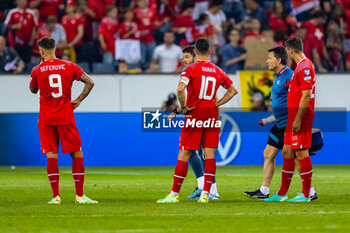 2023-06-19 - 19.06.2023, Lucerne, swisspoor arena, European Qualifiers: Switzerland - Romania, #9 Haris Seferovic (Switzerland), #10 Granit Xhaka (Switzerland) are disappointed about the draw in the last minutes of the match - EUROPEAN QUALIFIERS: SWITZERLAND - ROMANIA - UEFA EUROPEAN - SOCCER