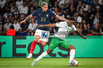 2023-09-07 - Theo HERNANDEZ of France and Chiedozie OGBENE of Ireland during the UEFA Euro 2024, European Qualifiers Group B football match between France and Republic of Ireland on September 7, 2023 at Parc des Princes stadium in Paris, France - FOOTBALL - EURO 2024 - QUALIFYING - FRANCE V REPUBLIC OF IRELAND - UEFA EUROPEAN - SOCCER