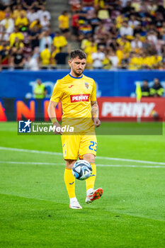 2023-09-12 - Deian Sorescu of Romania warming up during the UEFA Euro 2024, European Qualifiers, Group I football match between Romania and Kosovo on September 12, 2023 at Arena Nationala in Bucharest, Romania - FOOTBALL - EURO 2024 - QUALIFYING - ROMANIA V KOSOVO - UEFA EUROPEAN - SOCCER