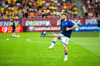 2023-09-12 - Betim Fazliji of Kosovo warming up during the UEFA Euro 2024, European Qualifiers, Group I football match between Romania and Kosovo on September 12, 2023 at Arena Nationala in Bucharest, Romania - FOOTBALL - EURO 2024 - QUALIFYING - ROMANIA V KOSOVO - UEFA EUROPEAN - SOCCER