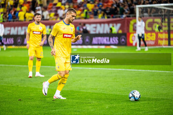 2023-09-12 - Adrian Rus of Romania warming up during the UEFA Euro 2024, European Qualifiers, Group I football match between Romania and Kosovo on September 12, 2023 at Arena Nationala in Bucharest, Romania - FOOTBALL - EURO 2024 - QUALIFYING - ROMANIA V KOSOVO - UEFA EUROPEAN - SOCCER