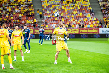 2023-09-12 - Denis Alibec of Romania warming up during the UEFA Euro 2024, European Qualifiers, Group I football match between Romania and Kosovo on September 12, 2023 at Arena Nationala in Bucharest, Romania - FOOTBALL - EURO 2024 - QUALIFYING - ROMANIA V KOSOVO - UEFA EUROPEAN - SOCCER