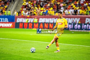 2023-09-12 - Mario Camora of Romania warming up during the UEFA Euro 2024, European Qualifiers, Group I football match between Romania and Kosovo on September 12, 2023 at Arena Nationala in Bucharest, Romania - FOOTBALL - EURO 2024 - QUALIFYING - ROMANIA V KOSOVO - UEFA EUROPEAN - SOCCER