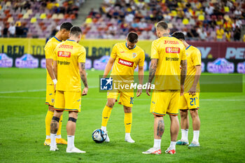 2023-09-12 - Razvan Marin of Romania warming up during the UEFA Euro 2024, European Qualifiers, Group I football match between Romania and Kosovo on September 12, 2023 at Arena Nationala in Bucharest, Romania - FOOTBALL - EURO 2024 - QUALIFYING - ROMANIA V KOSOVO - UEFA EUROPEAN - SOCCER