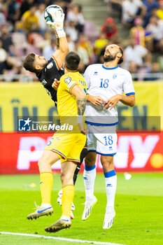 2023-09-12 - Horatiu Moldovan of Romania and Vedat Muriqi of Kosovo during the UEFA Euro 2024, European Qualifiers, Group I football match between Romania and Kosovo on September 12, 2023 at Arena Nationala in Bucharest, Romania - FOOTBALL - EURO 2024 - QUALIFYING - ROMANIA V KOSOVO - UEFA EUROPEAN - SOCCER