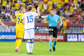 2023-09-13 - Referee Willy Delajod giving penalty to Romania during the UEFA Euro 2024, European Qualifiers, Group I football match between Romania and Kosovo on September 12, 2023 at Arena Nationala in Bucharest, Romania - FOOTBALL - EURO 2024 - QUALIFYING - ROMANIA V KOSOVO - UEFA EUROPEAN - SOCCER