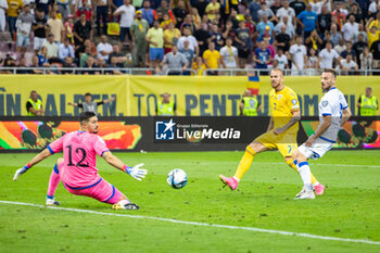 2023-09-13 - Denis Alibec of Romania shoots at goal during the UEFA Euro 2024, European Qualifiers, Group I football match between Romania and Kosovo on September 12, 2023 at Arena Nationala in Bucharest, Romania - FOOTBALL - EURO 2024 - QUALIFYING - ROMANIA V KOSOVO - UEFA EUROPEAN - SOCCER