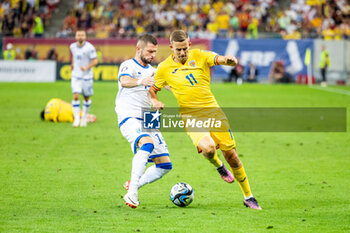 2023-09-13 - Nicusor Bancu of Romania and Valon Berisha of Kosovo during the UEFA Euro 2024, European Qualifiers, Group I football match between Romania and Kosovo on September 12, 2023 at Arena Nationala in Bucharest, Romania - FOOTBALL - EURO 2024 - QUALIFYING - ROMANIA V KOSOVO - UEFA EUROPEAN - SOCCER