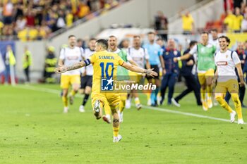 2023-09-13 - Nicolae Stanciu of Romania celebrates scoring his team's first goal to make the score during the UEFA Euro 2024, European Qualifiers, Group I football match between Romania and Kosovo on September 12, 2023 at Arena Nationala in Bucharest, Romania - FOOTBALL - EURO 2024 - QUALIFYING - ROMANIA V KOSOVO - UEFA EUROPEAN - SOCCER