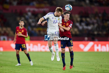 2023-10-12 - Stuart Armstrong of Scotland and Pablo Martin Paez Gavira ‘Gavi’ of Spain during the UEFA EURO 2024, European Qualifiers Group A football match between Spain and Scotland on October 12, 2023 at La Cartuja stadium in Sevilla, Spain - FOOTBALL - EURO 2024 - QUALIFYING - SPAIN V SCOTLAND - UEFA EUROPEAN - SOCCER