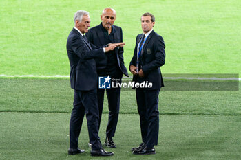 2023-10-13 - BARI, ITALY - OCTOBER 13: Gabriele Gravina president of FIGC, Luciano Spalletti head coach of Italy and Giovanni Valentini of FIGC during pitch inspection at Stadio San Nicola on October 13, 2023 in Bari, Italy. - PRESS CONFERENCE ITALY - UEFA EUROPEAN - SOCCER