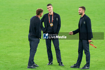 2023-10-13 - BARI, ITALY - OCTOBER 13: Bryan Cristante, Gianluca Mancini and Giovanni Di Lorenzo of Italy look on during pitch inspection at Stadio San Nicola on October 13, 2023 in Bari, Italy. - PRESS CONFERENCE ITALY - UEFA EUROPEAN - SOCCER